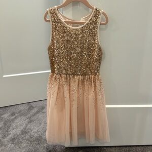 Adorable Gap Kids pink sequined dress with tulle overlay in size Medium.